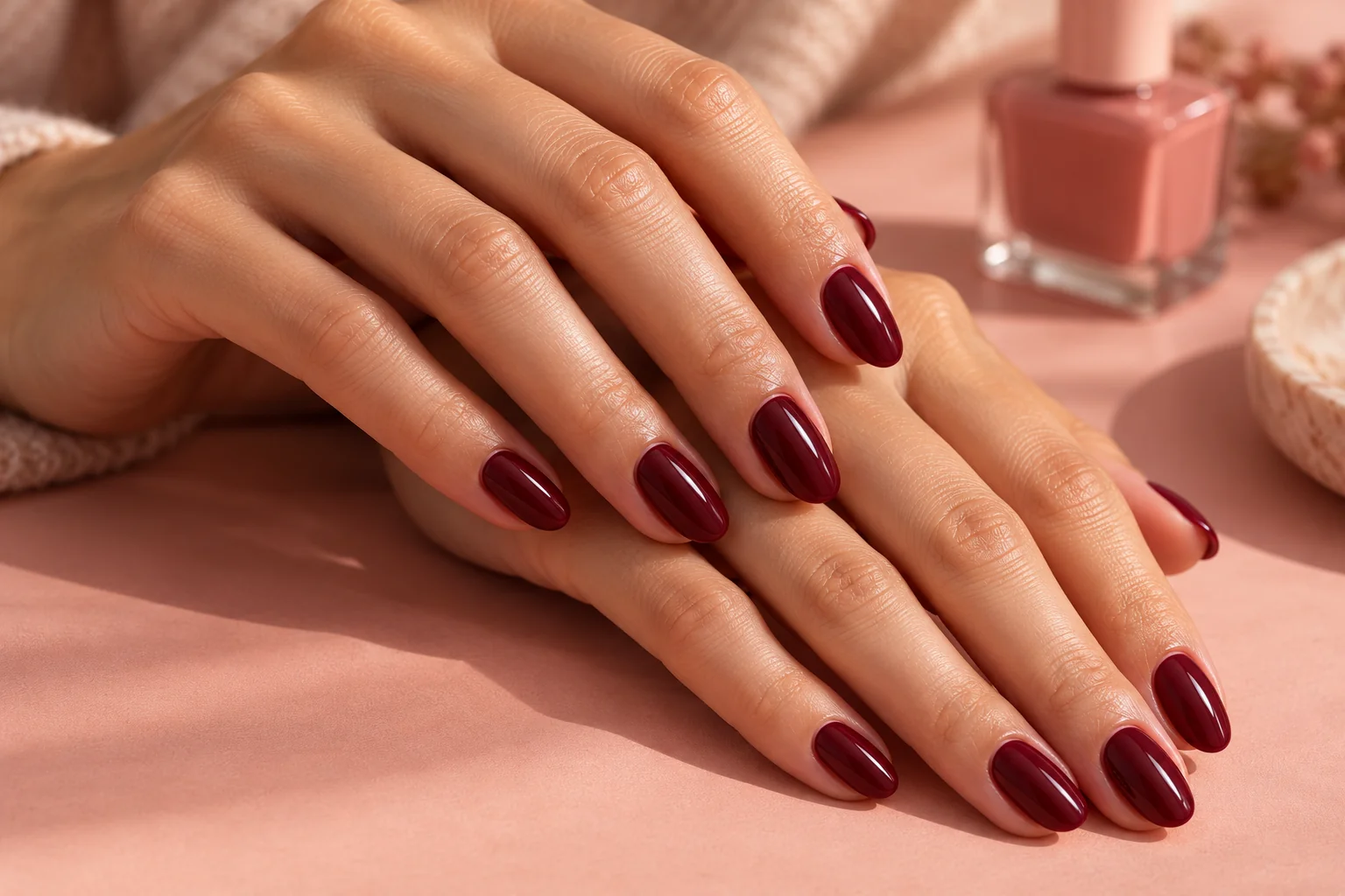 Sample nail design: glossy coral manicure photographed in close detail